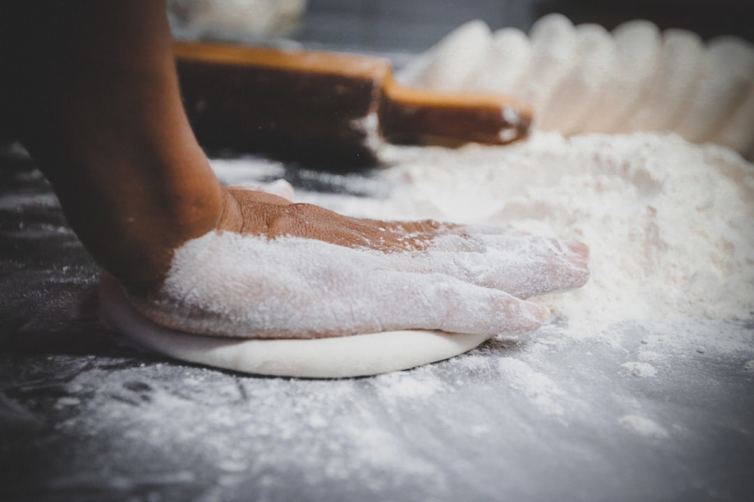 baker kneading dough