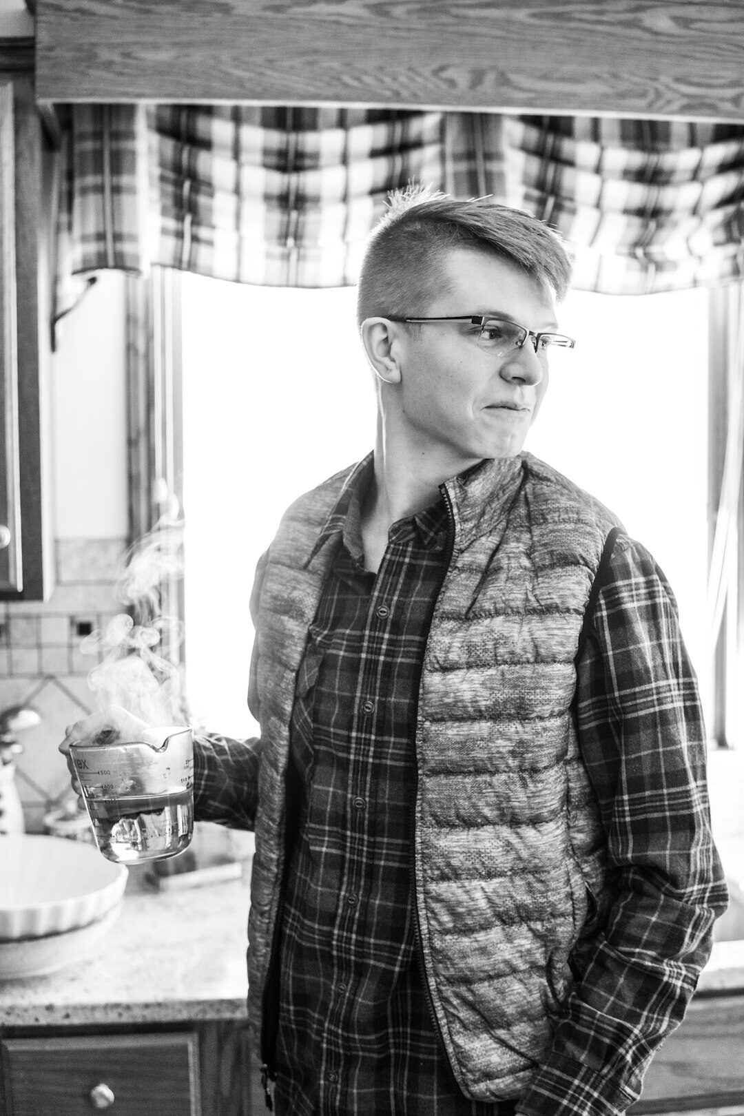 Portrait of a Czech woman editor in a home kitchen