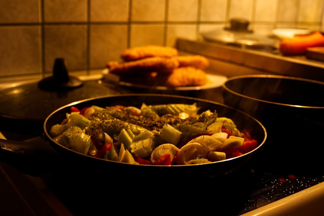 Fresh vegetables and herbs on a kitchen counter